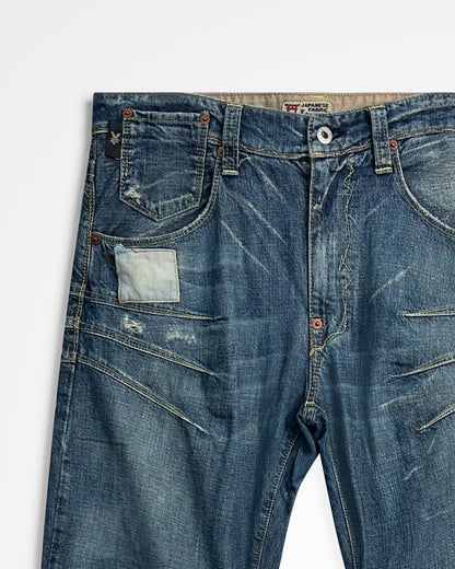 Michiko Koshino, Yen Jeans Multi-Dart Patched Jeans